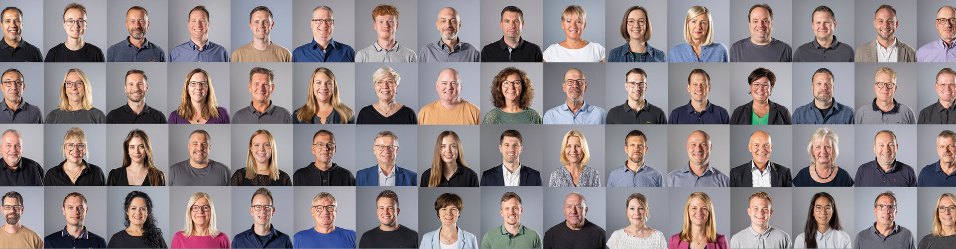 Collage aus vielen einzelnen Porträtfotos von Mitarbeitenden der WBG Lünen. Die Personen sind frontal vor neutralem grauem Hintergrund fotografiert und in mehreren Reihen übersichtlich angeordnet.